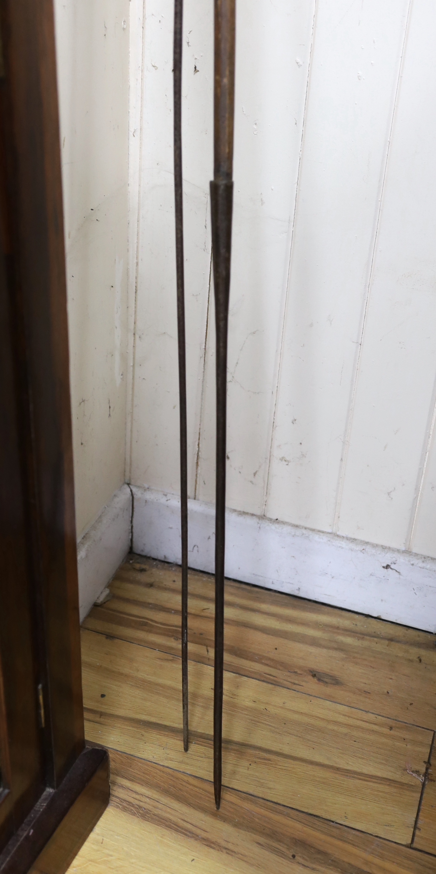 Two tribal spears, approximately 240cm long